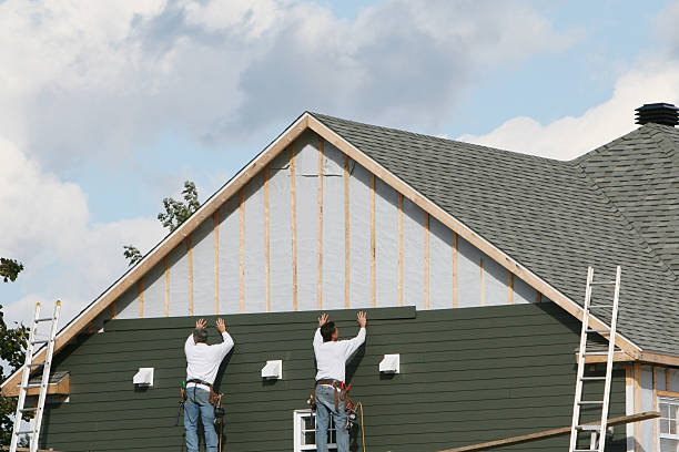 Professional Storm Damage Siding Repair technician working in Black Mountain, NC